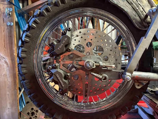 DUAL TOKICO REAR CALIPER MOUNT