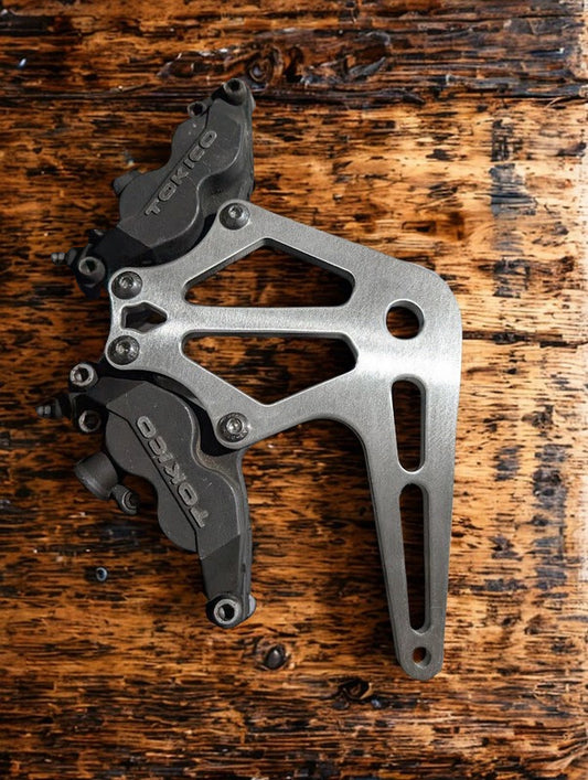 DUAL TOKICO REAR CALIPER MOUNT